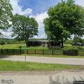 Man brings rifle during dispute at auction barn