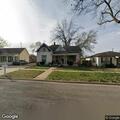 Person experiencing back pain near E Mulvane St