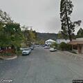 Person reported unconscious with headache on 7th Street