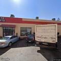Low hanging wires behind auto parts store