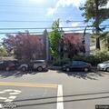 Person stuck on apartment roof in Belmont