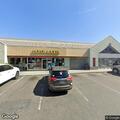 Person unresponsive outside liquor store receiving mouth-to-mouth