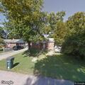 Person experiencing abdominal pain at Olson Lane
