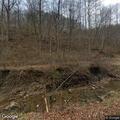 Trees blocking creek near roadway at Callahan Branch
