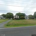 Person experiencing abdominal pain near Belle Haven