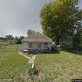 Abandoned house fire near railroad tracks in Burgess