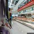 Person with large open leg sores found outside store