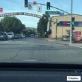 Flatbed truck hits barricade at Broadway crossing