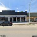 Intoxicated woman unconscious after falling off bar stool