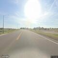 Single vehicle rollover crash near industrial park