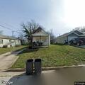 Dog attacking man near South Clark Avenue