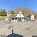 Motorcycle and car collision near restaurant