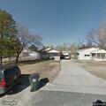 Police check open door during welfare visit at residence