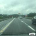 Disabled truck blocking third lane near mile marker