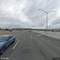 Two cars stopped on shoulder after crash