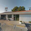 Electrical pole fire behind Wine Rack store