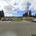 Woman lying on sidewalk on Galway Drive in Ashland