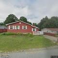Person with possible dislocated shoulder at home