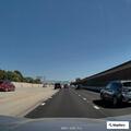 Children and SUV stopped on freeway ramp