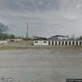 Officer checks vehicle at storage facility