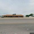 Traffic stop involving white Buick at liquor store