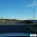 Traffic stop on gray Ford sedan at Kroger lot