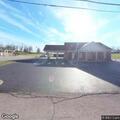 Woman talking to herself outside Rineyville bank