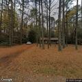 Officer searching for stolen item at residence