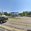 Woman found unconscious at gas station pump