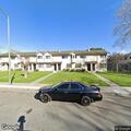 Person experiencing abdominal pain near 10th Street, Oakland