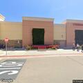 Shoplifting suspects flee in white Cadillac hatchback