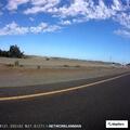 Pedestrian walking along I-5 south of Louise