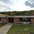 Person found unconscious and unresponsive at care center