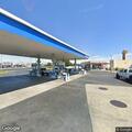 Two-vehicle crash in Chevron parking lot