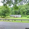 Single SUV crash on Mud Fork Road curve