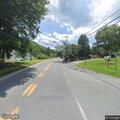 Tree blocking one lane on Route 3 near Peachtree Road