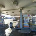 Person throwing objects near gas station detained