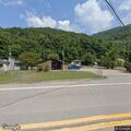 Wire and pole blocking road near Wharton Post Office