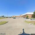 Officer conducts vehicle search near high school