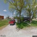 Unknown man found in carport, flees north