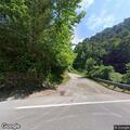 Man in black car reported setting hillside fires