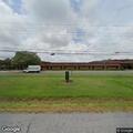 Person with breathing difficulty at Arcadia High School gym