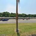 Person walking on Dollar General roof