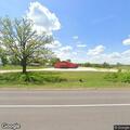 Unoccupied car with flat tire checked at Red Shed