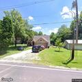 Unfamiliar vehicle reported in backyard