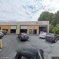 43-year-old woman found unconscious at auto body shop