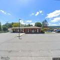 White Volkswagen Jetta at City National; male driver may have firearm