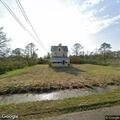 Caretaker reports unauthorized person living in trailer