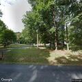 Tree blocking part of roadway on Paines Mill Road