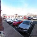 Person having panic attack in car at Starbucks
